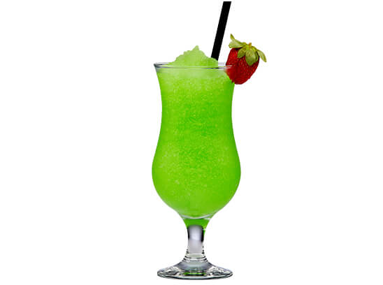 green melon splice cocktail with a strawberry on the rim of the glass